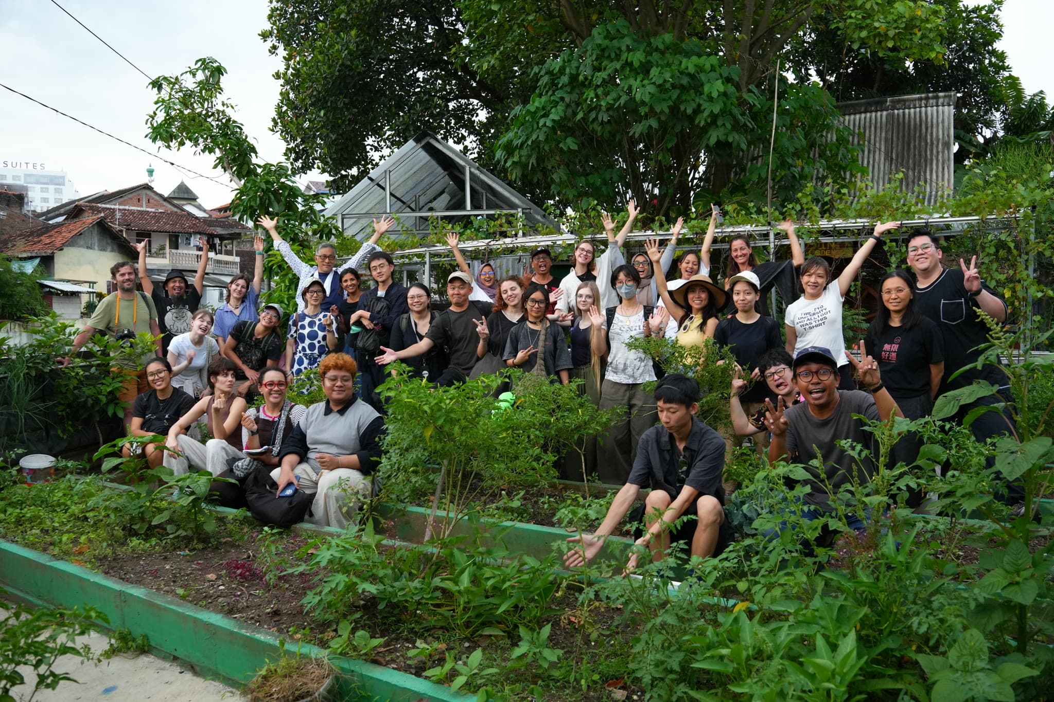 Volunteers tending the community garden on the banks of Kali Code